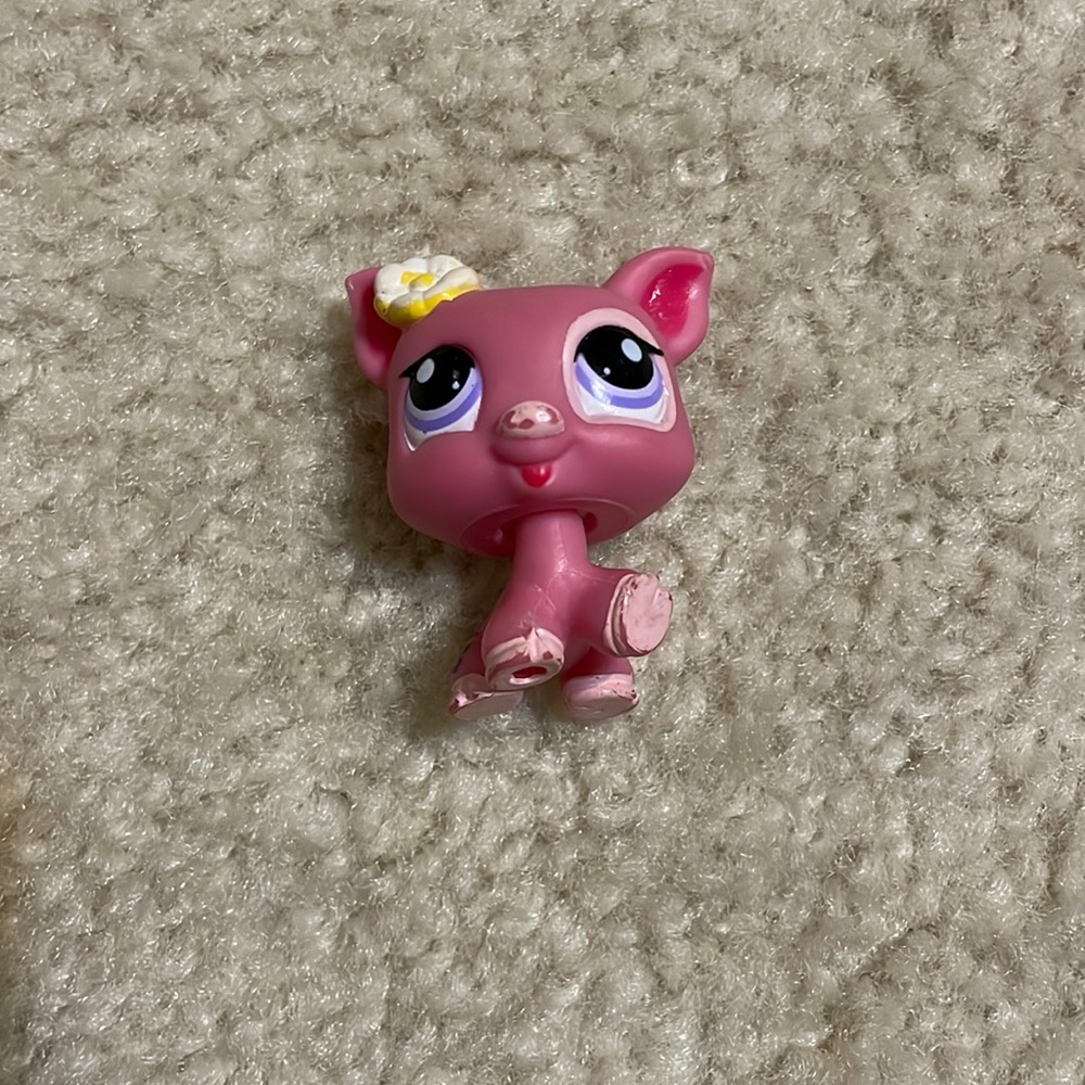 littlest petshop piglet, painted the flower w nail polish, should remove.